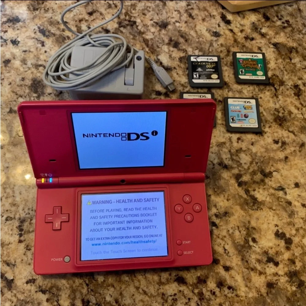 DS Pink Console, Stylus  Pen, Four (4) Games & Charger